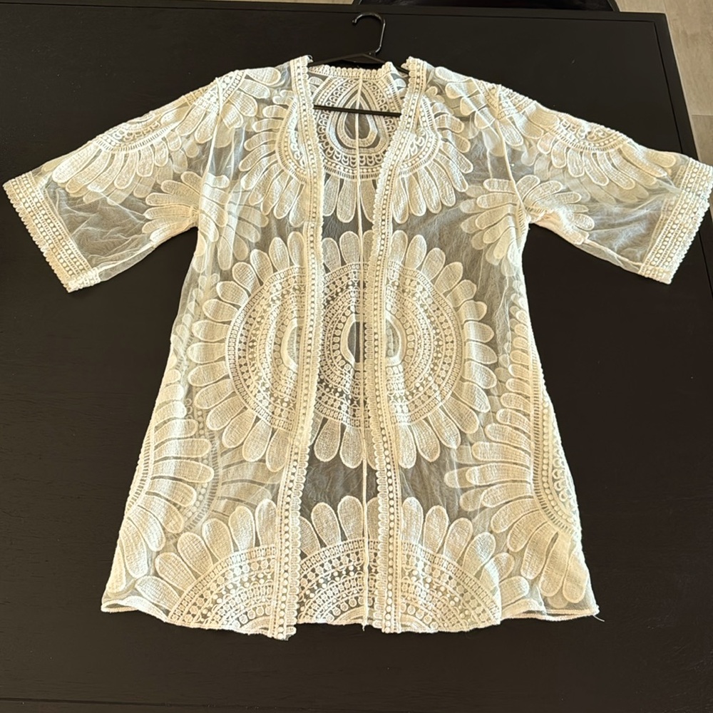 Share bathing suit cover-up